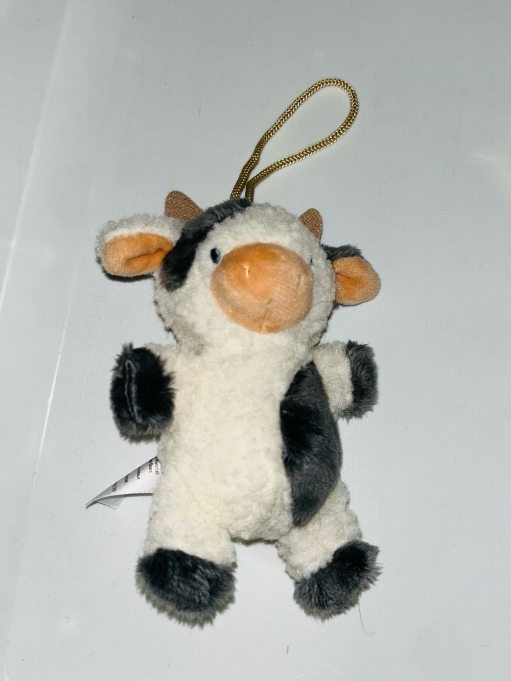 Itzy ritzy cow pacifier holder